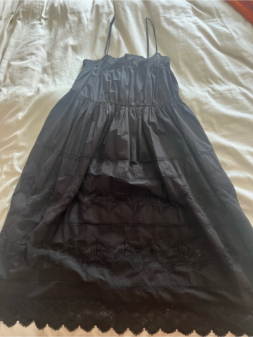 THE GREAT. Black Eyelet A-Line Midi Dress with Spaghetti Straps